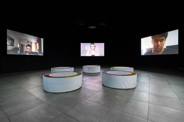 In Real Life, Liz Magic Laser, 2019, 5-channel HD video installation, 90 minutes; custom seating (dimensions variable). Commissioned by FACT, Liverpool, UK. Photo: Rob Battersby.